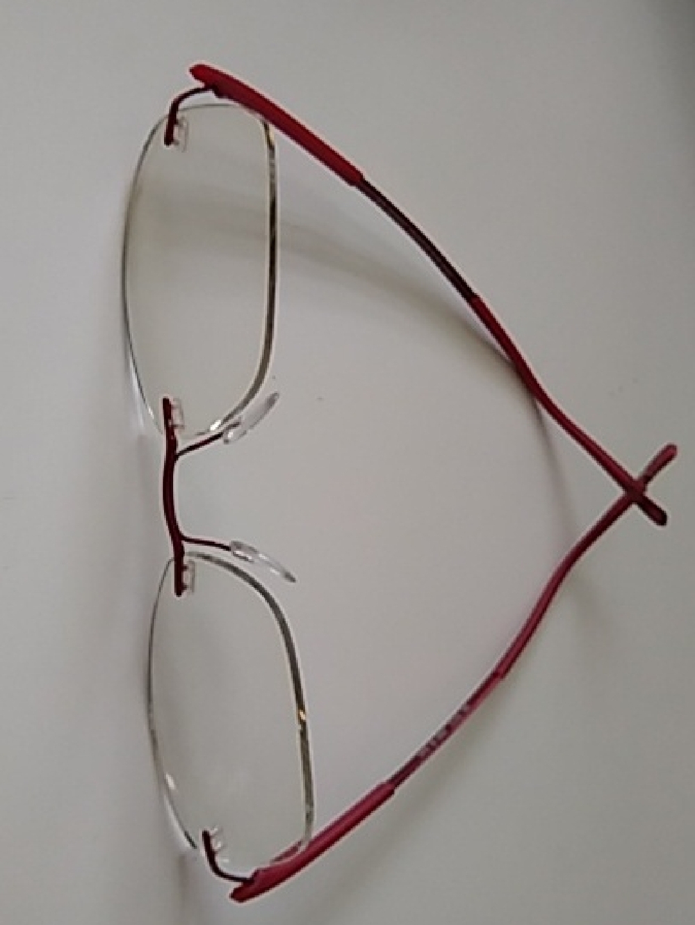 Silhouette Women's Rimless Glasses with Red Temples
